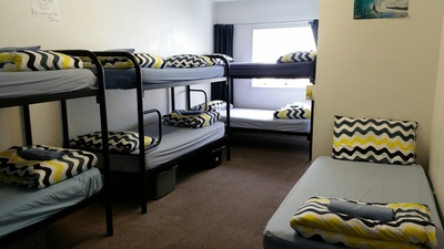 8 person mixed dorm bed weekly rate