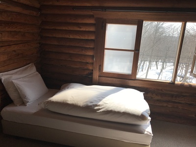 Bed in Deluxe dorm room