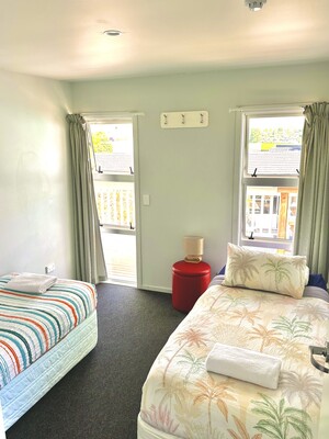 Twin room with shared bathroom