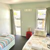 Twin room with shared bathroom